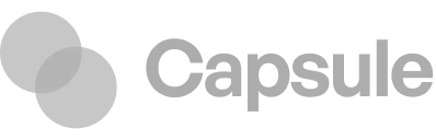 Capsule company logo with two overlapping gray circles to the left of the word Capsule.